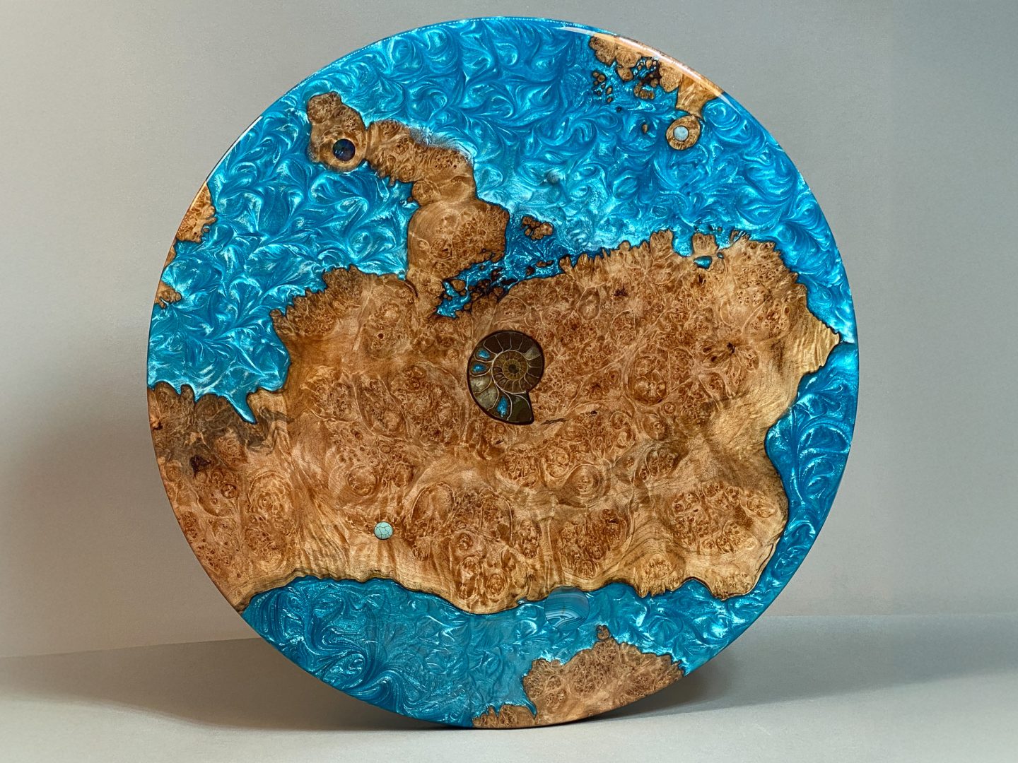 handcrafted jewelry piece made in jewelry workshop with maple burl, ammonite, larimar, crystal, opal, and turquoise at Anderson Ranch Arts Center