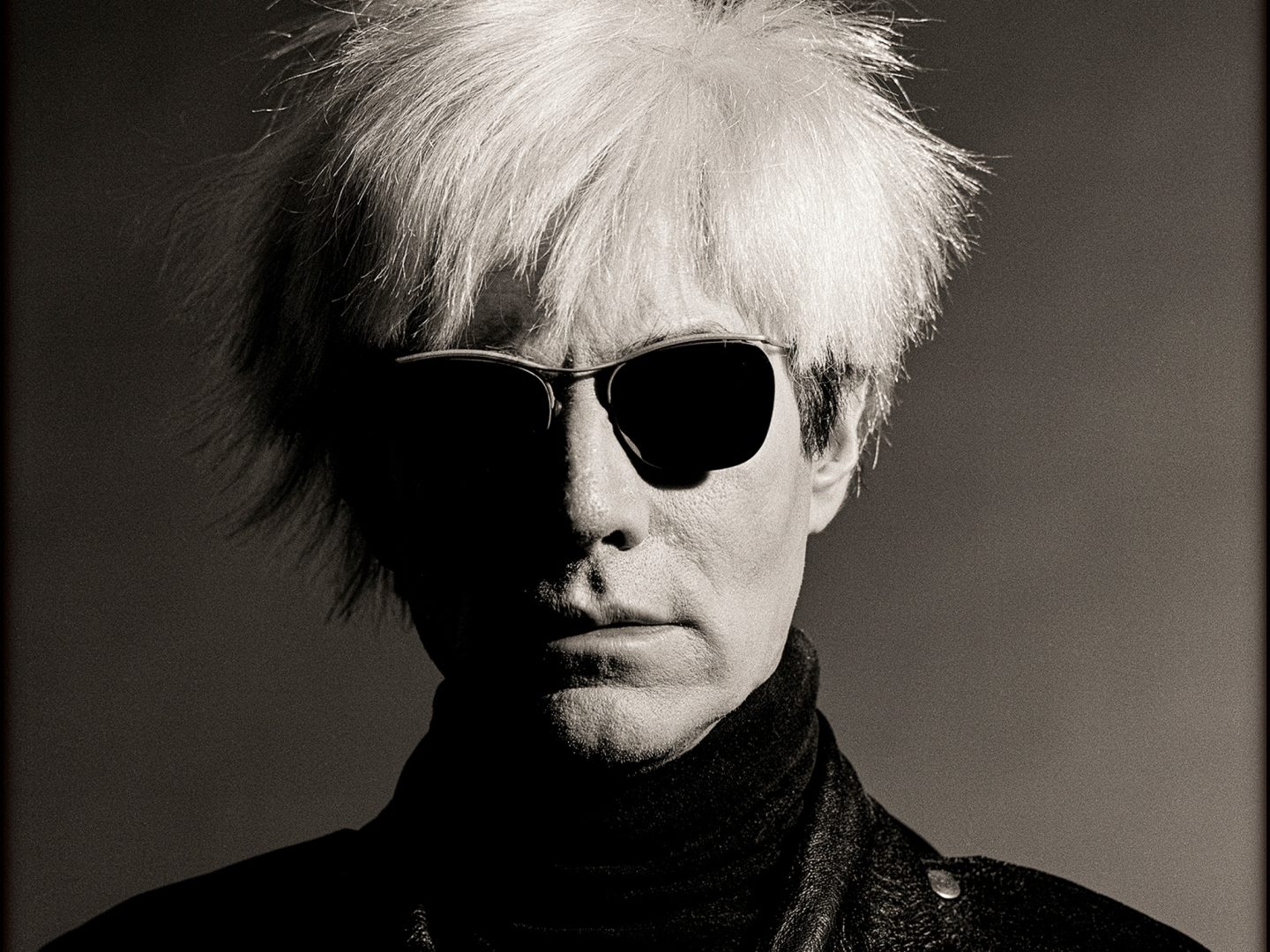 Portrait photograph of Andy Warhol by Greg Gorman, shot on analog film in 1986, featured for The Connected Portrait workshop.