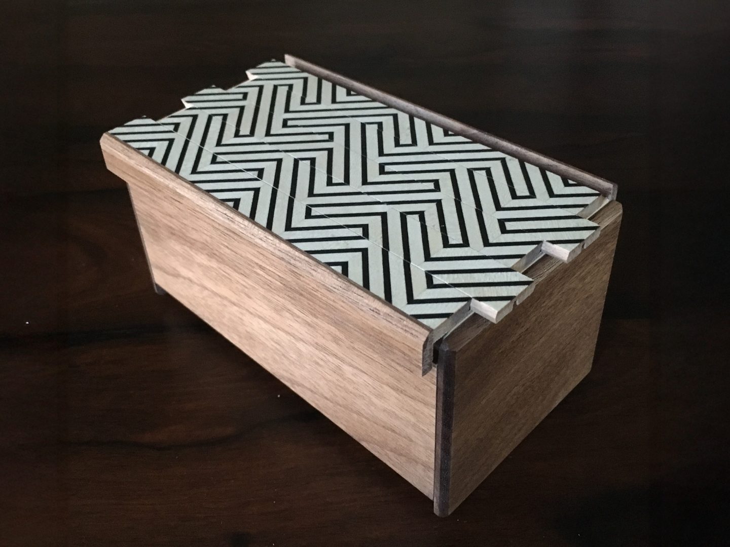 traditional Japanese puzzle boxes displayed on a woodworking studio table at Anderson Ranch Arts Center
